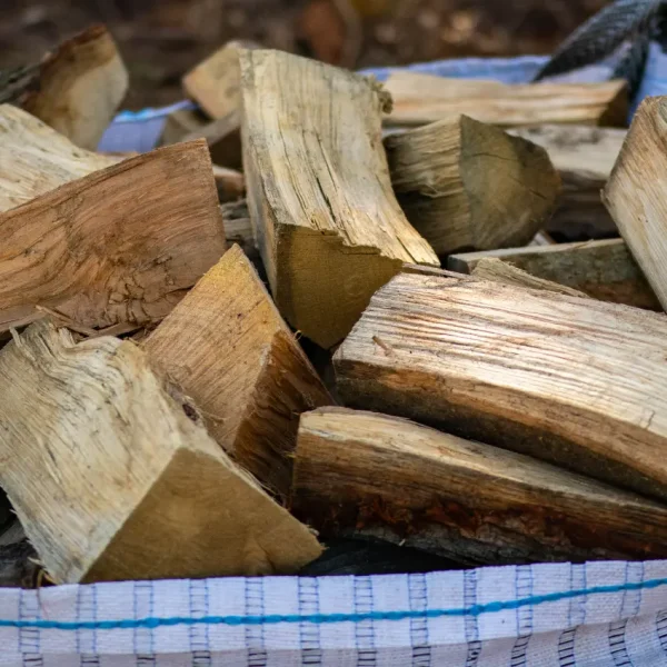 Close-up of a bulk bag of hardwood firewood for sale in Stowmarket area