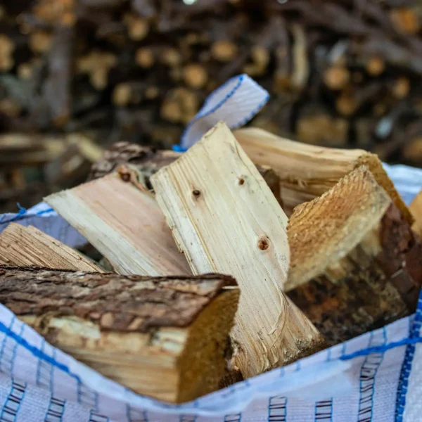 Close-up of a Barrow bag of larch firewood delivered to Stowmarket area